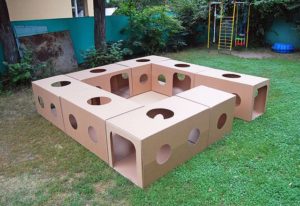 Create a backyard tunnel with cardboard! A tunnel created out of cardboard