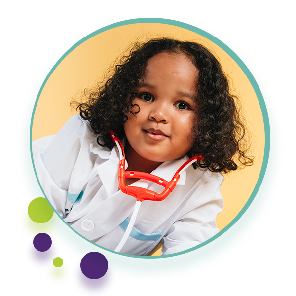 Smiling child with a toy stethoscope
