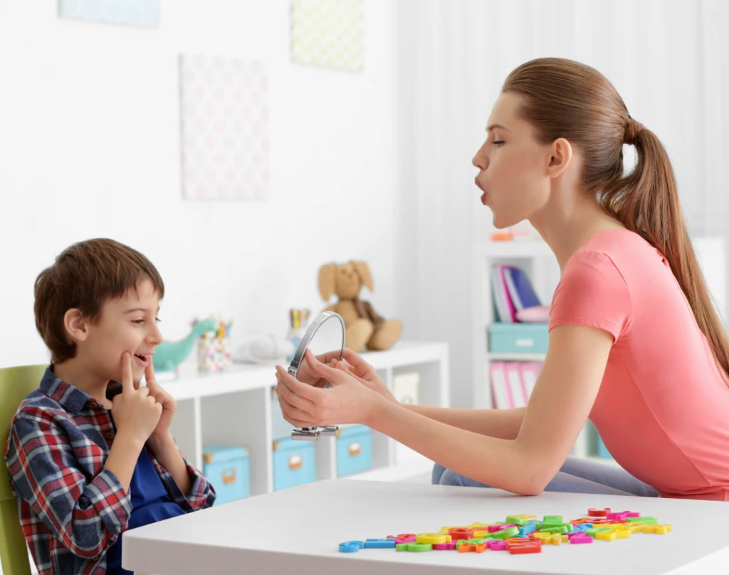 speech therapist working with child