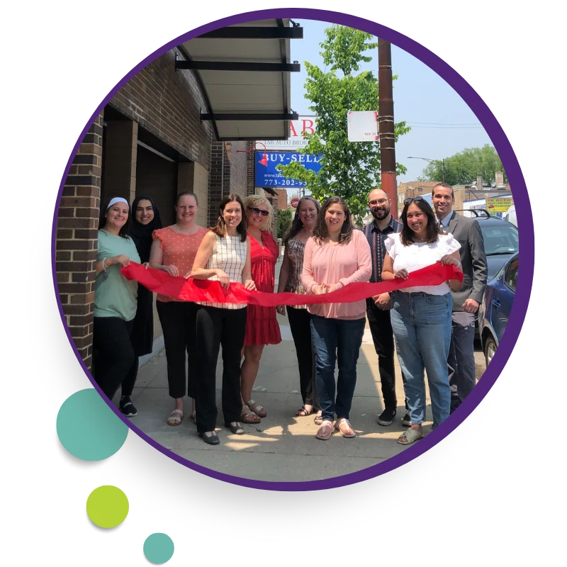The Clubhouse team at a ribbon cutting