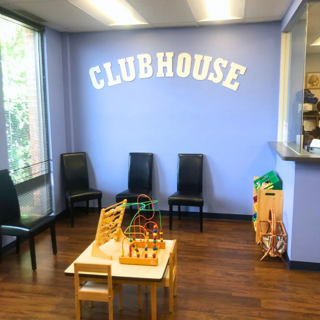 Downers Grove clinic waiting area with the Clubhouse sign